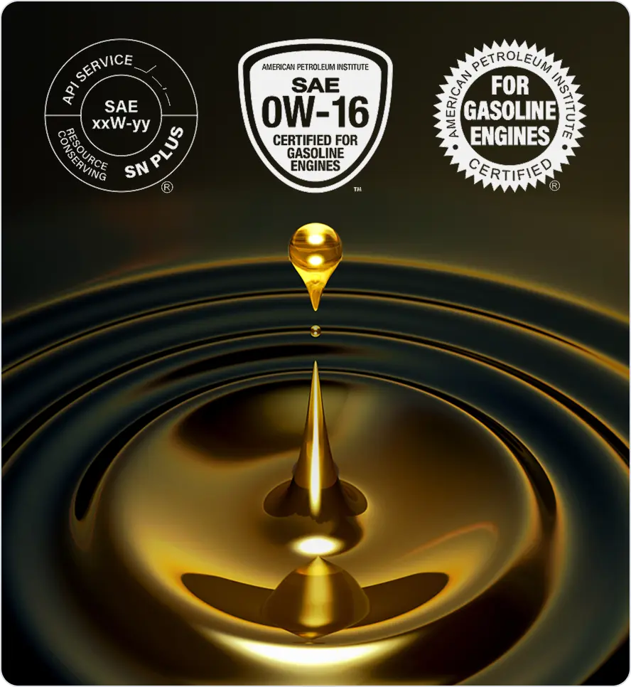 Oil droplet with certification logos on a dark background